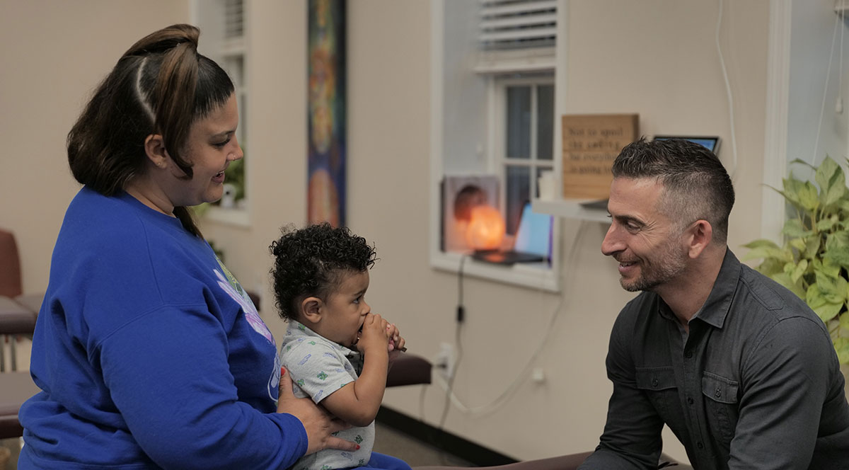 Doctor talking to family