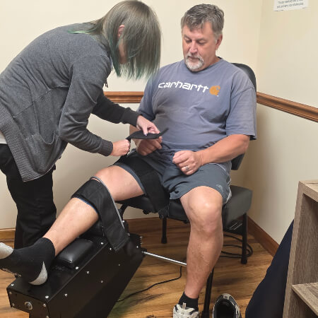 Denver patient being treated with Integrative Knee Therapy