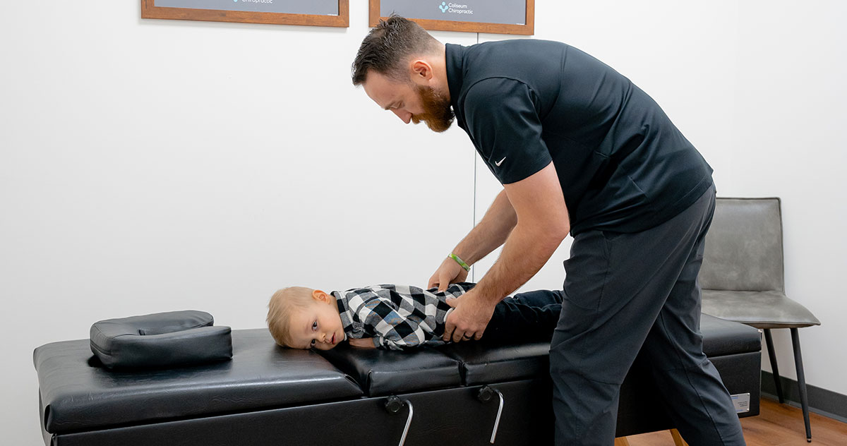 Boy on adjusting table