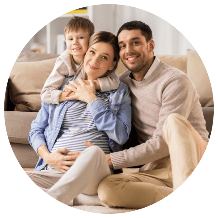Boy touching paper heart