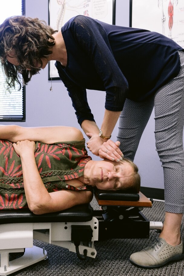 Dr. Bre Lambach with patient