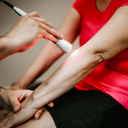 Laser therapy on forearm
