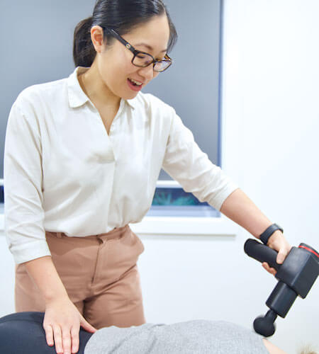 Dr Danie massaging patient