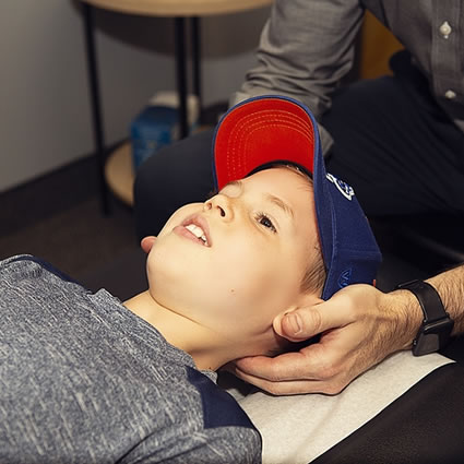 boy being adjusted