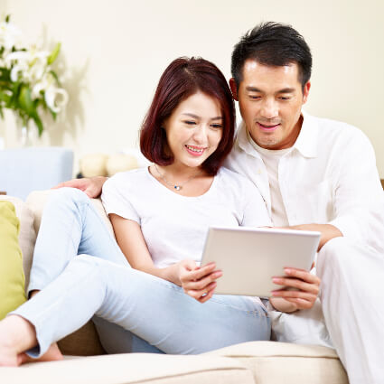 Couple looking at tablet
