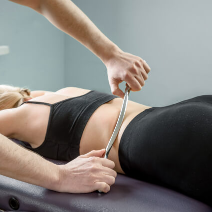 Graston Technique used to treat female patient