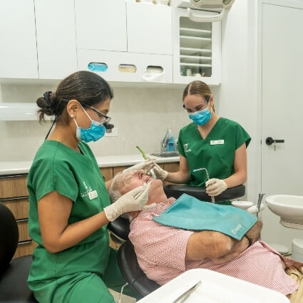 Shenton Park dentist Dr Ash doing checkup on patient