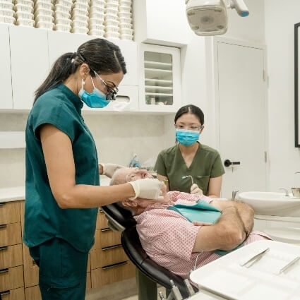 Shenton Park dentist Dr Zara cleaning patients teeth