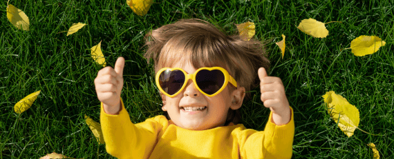smiling-child-with-thumbs-up