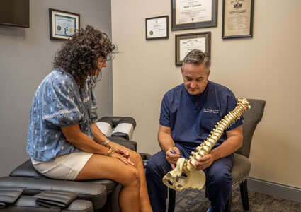 spine model consult with patient