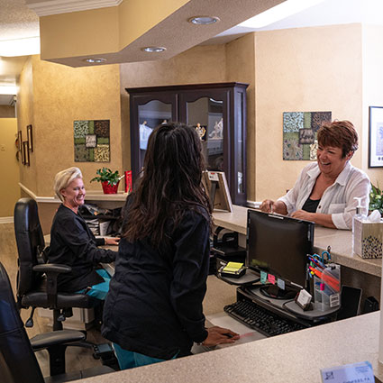 ladies at reception desk