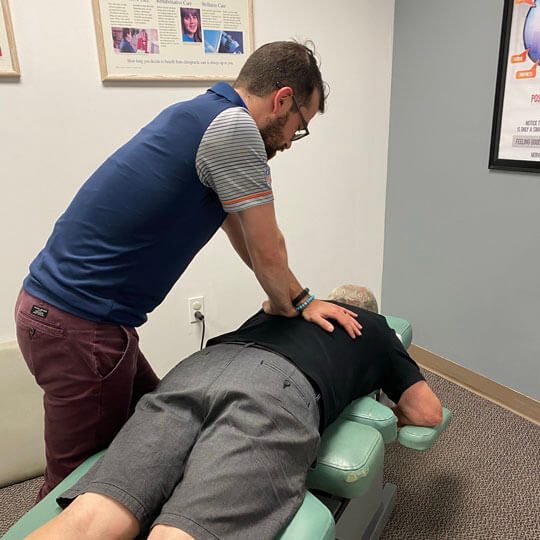 Dr. Forstner adjusting a patient