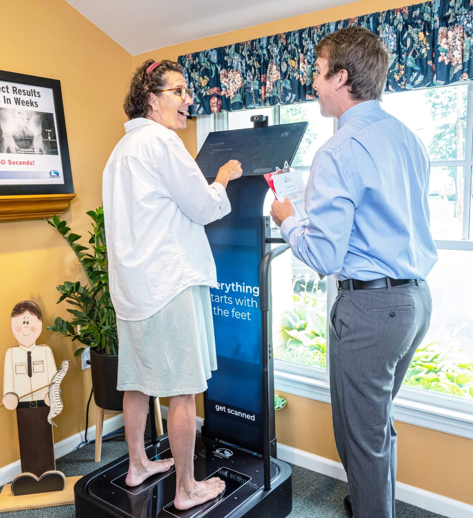 Dr. Anson talking to patient