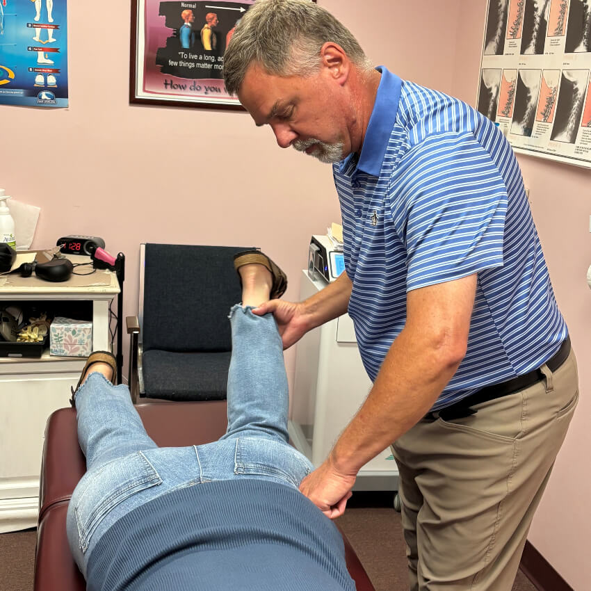 patient having legs adjusted