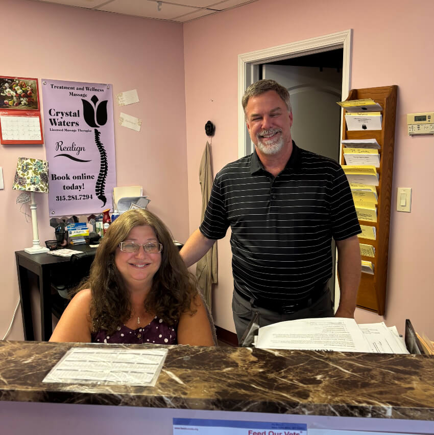 our New York Mills doctor and Denise behind the front desk