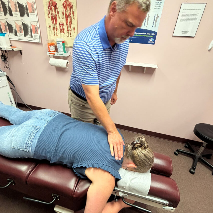 patient having neck adjusted