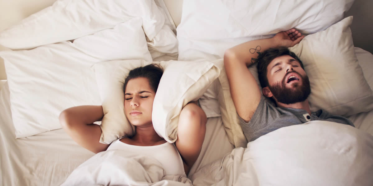 couple on bed sleep distraction