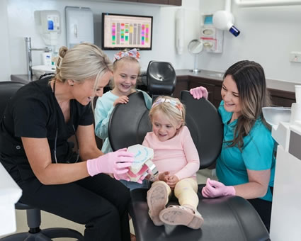 Kids in dental chair