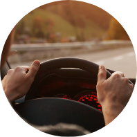 holding steering wheel