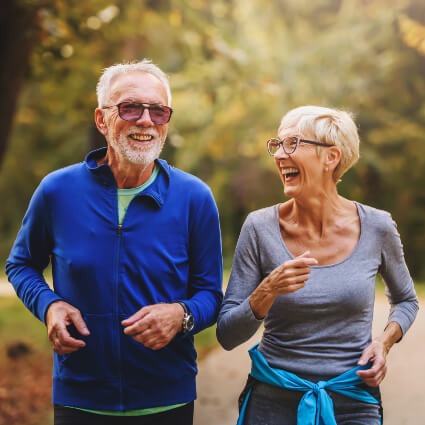 Senior couple jogging