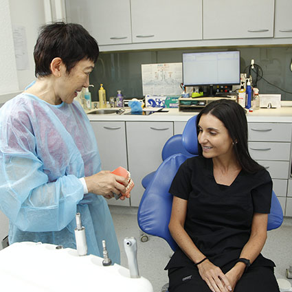 female dentist with patient