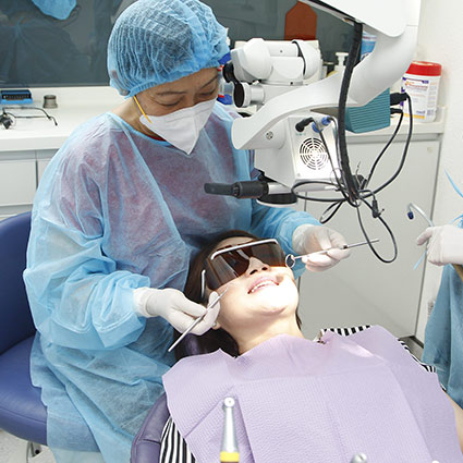 patient in chair during dental procedure
