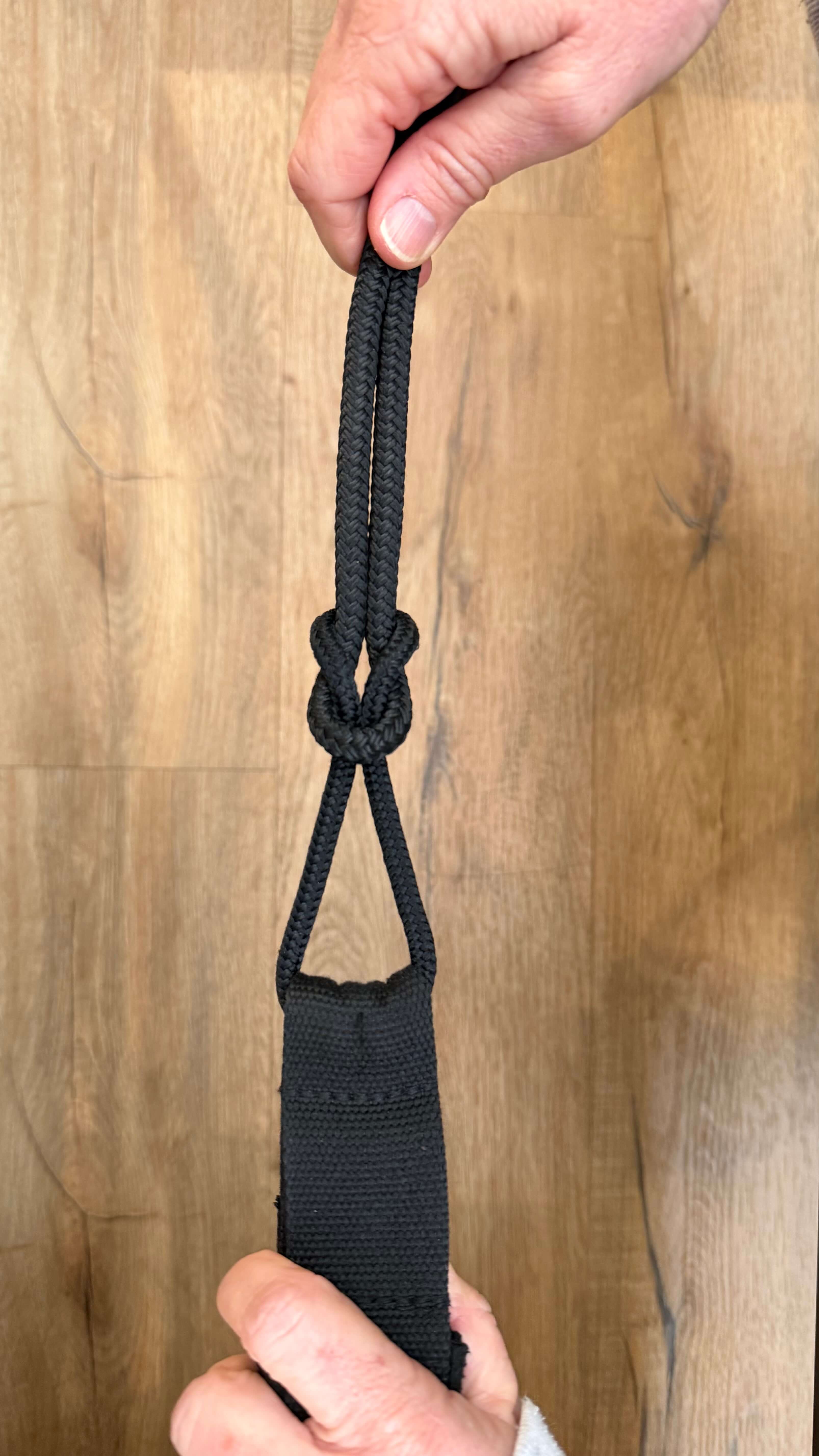 Strap secured to the rope, ready to thread through pulleys