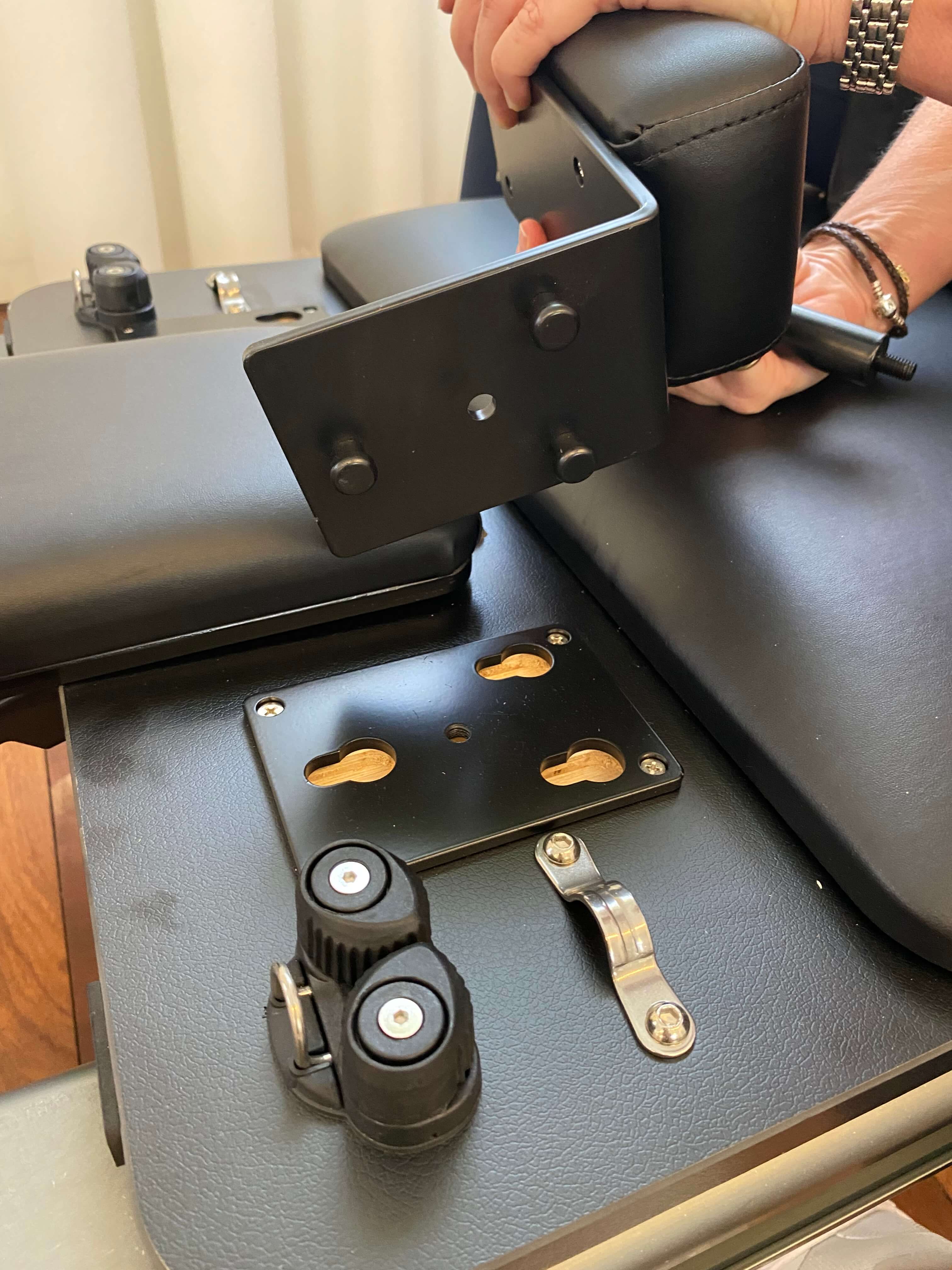 Installing shoulder pads onto the pole