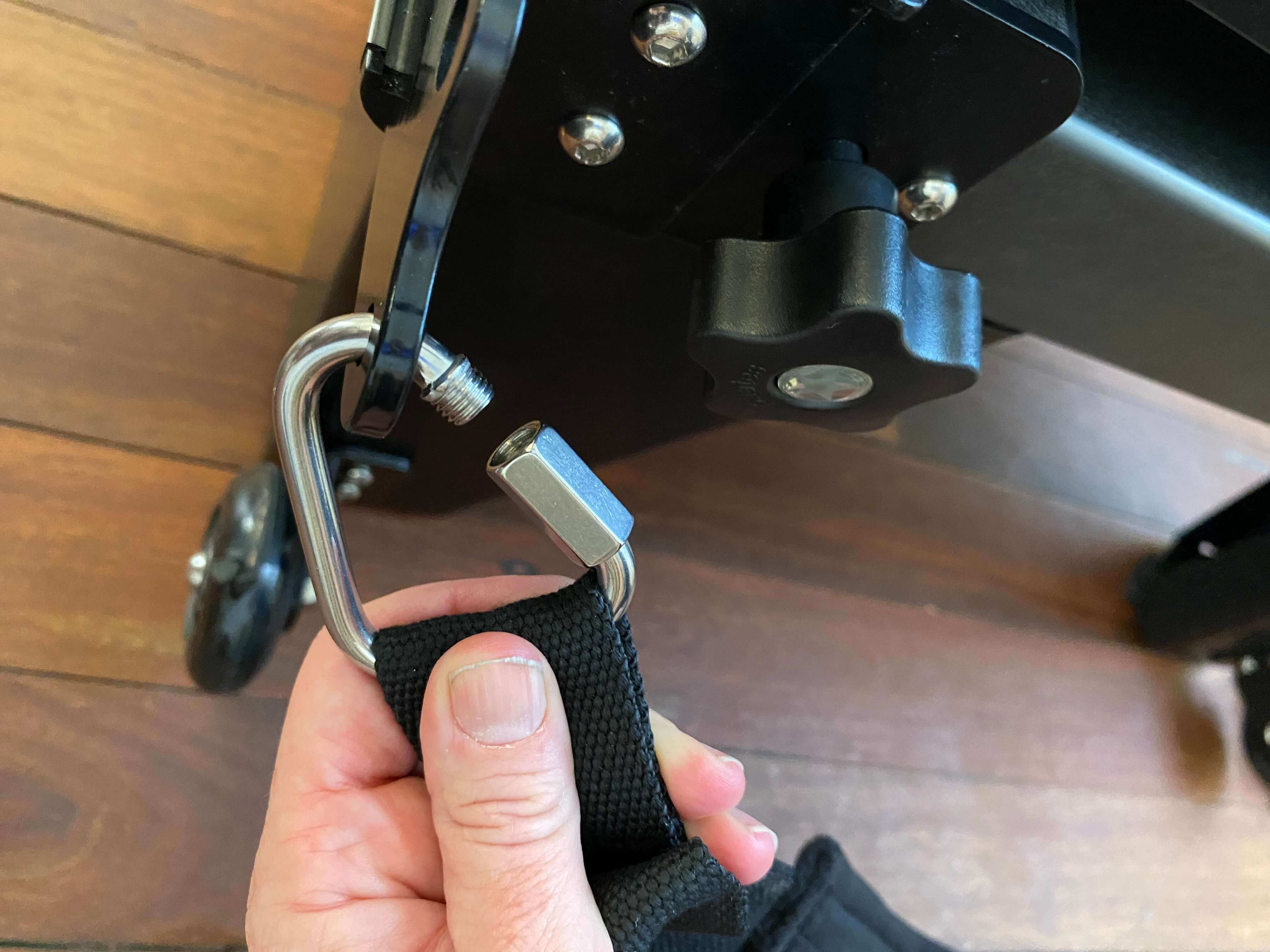 Foot strap attached through the bottom hole of the end plate