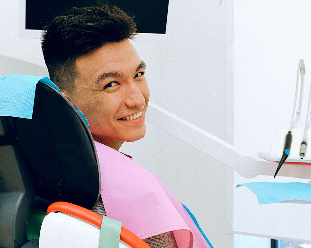 man-smiling-in-dental-chair