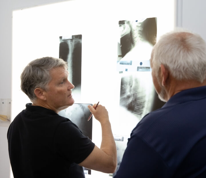 Dr. Bernard showing X-Ray