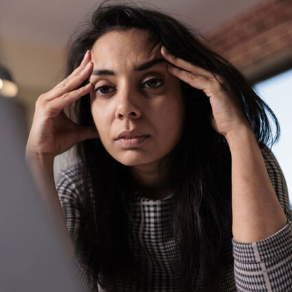 Woman looking at computer