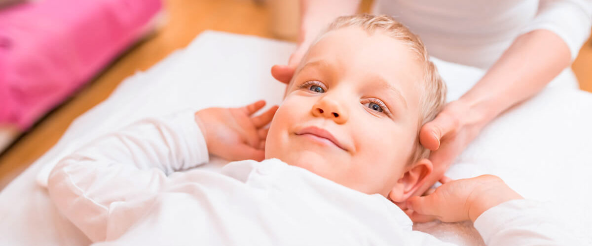 smiling child being adjusted