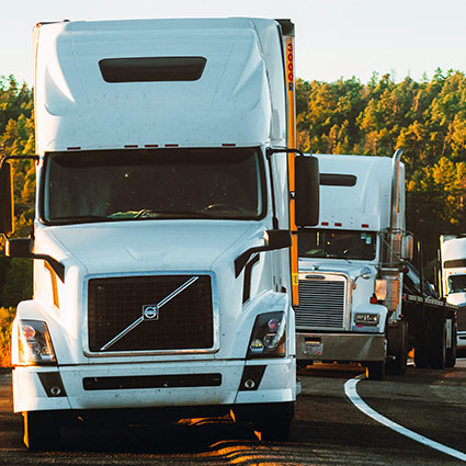 semi trucks on a road