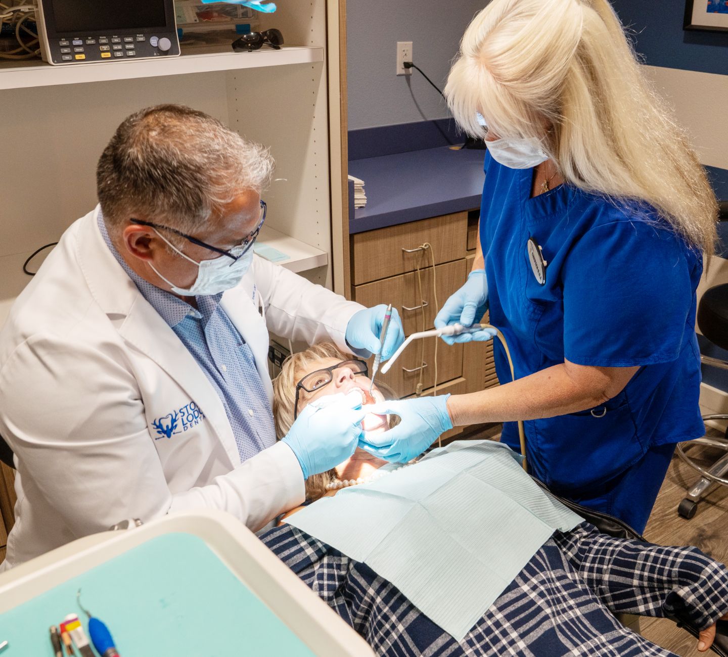 A patient receiving a dental cleaning