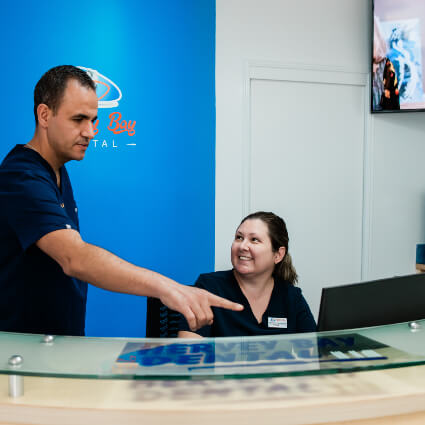 Dr Felilpe with receptionist