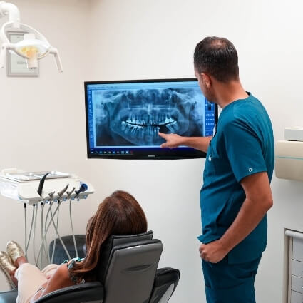 New Patients Dr Felipe showing patient xrays