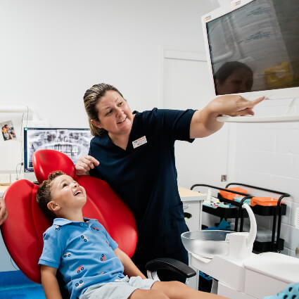 Child looking at xray screen