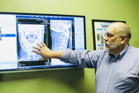 Dr. Steve Niemiec reviewing x-rays