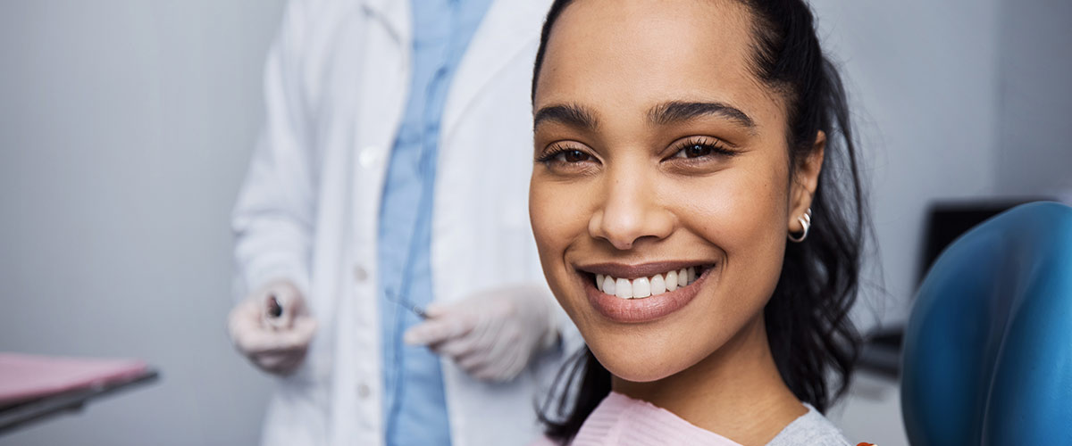 smiling person in dental chair