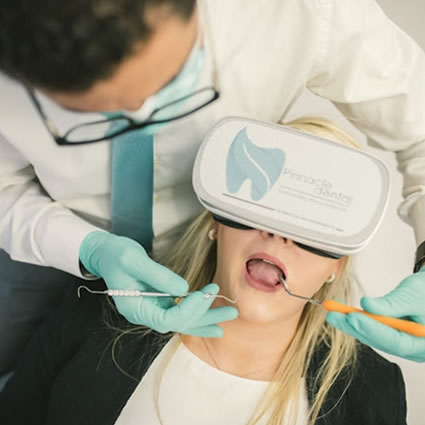 dentist with female patient