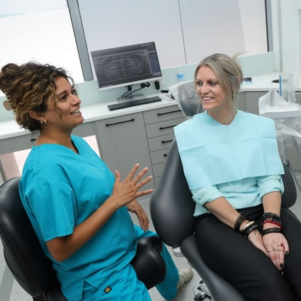 patient smiling during consultation 