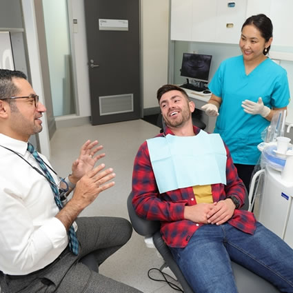 patient with dr wessam during dental visit