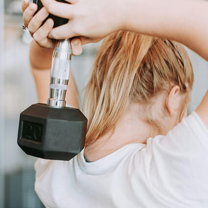 Blonde-woman-weight-training
