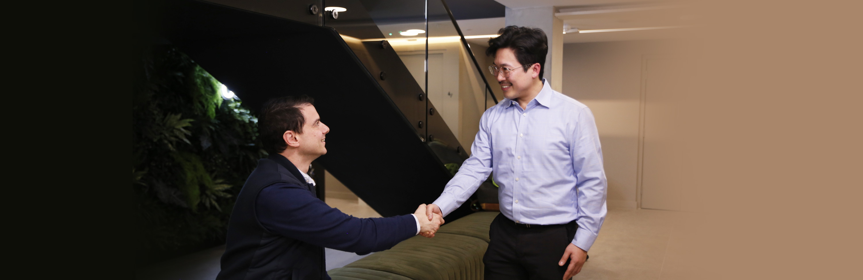 Dr. Harvey shaking hands with patient