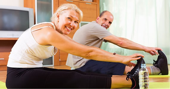 older couple stretching