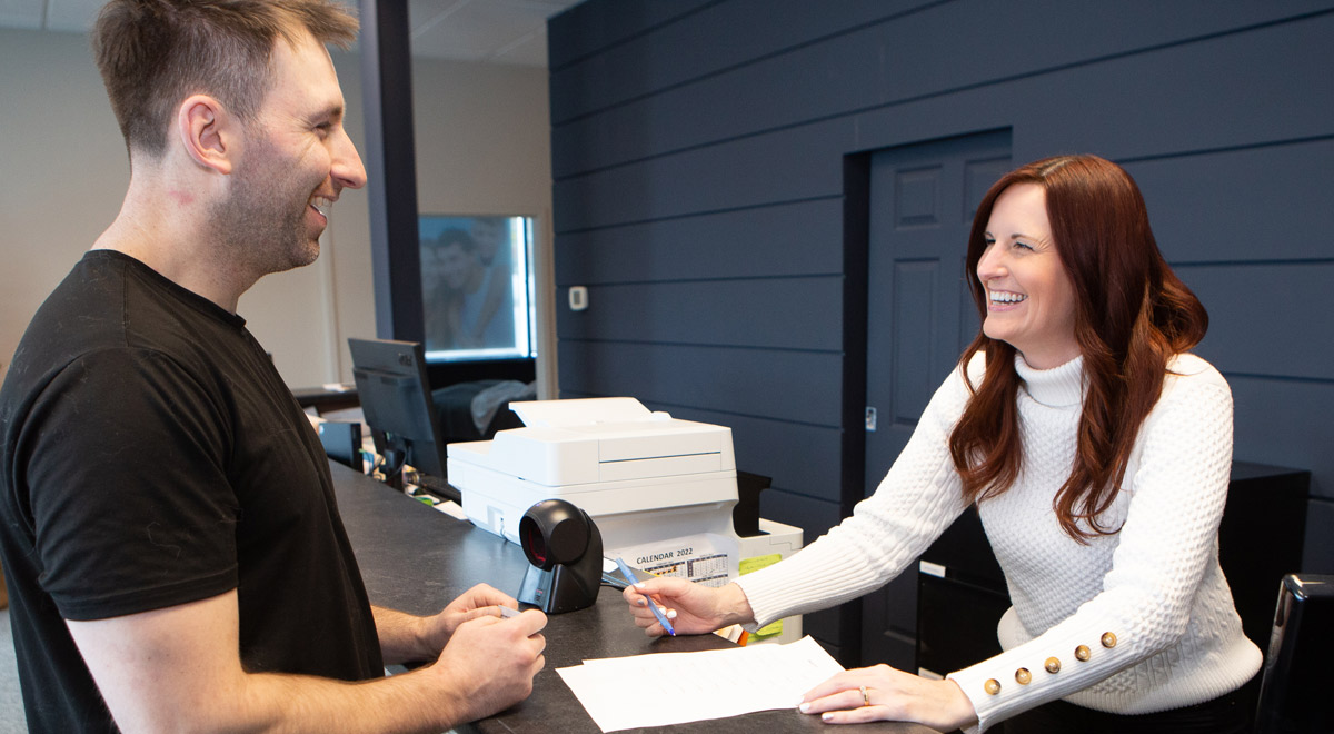 A patient being greeted at reception