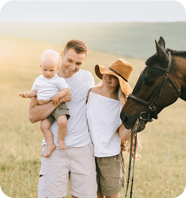 Family of three with horse