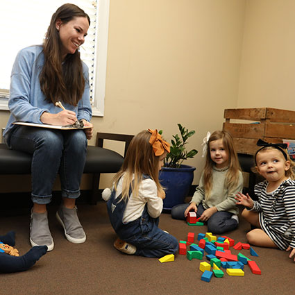 Happy children playing in the waiting room