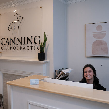 Canning Chiropractic and Laser Pain Solutions receptionist smiling